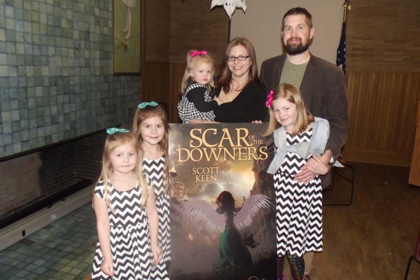 Scott and his family at a book signing.