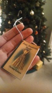 A Christmas ornament my mom made me to celebrate my first book (She even included the blurbs and a wee little ISBN!)