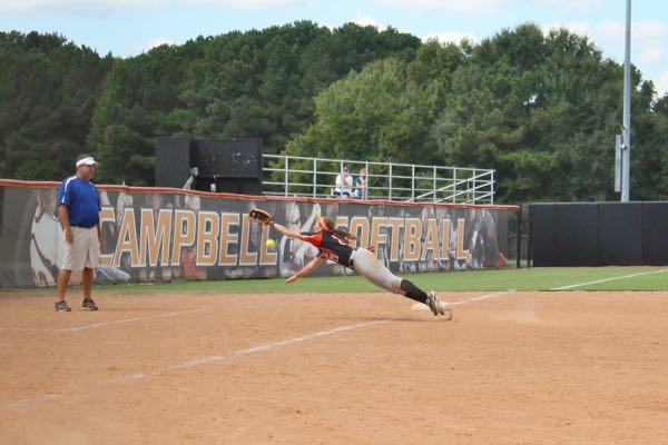 Victoria dives for the ball.