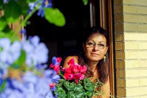 woman-flowers-window-2