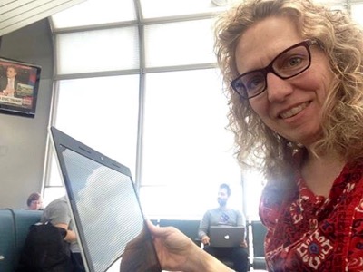 Write every day! Even on her book tour last summer, Michelle found time to write in airports, hotels and restaurants along the way. Here she is at O’Hare International.