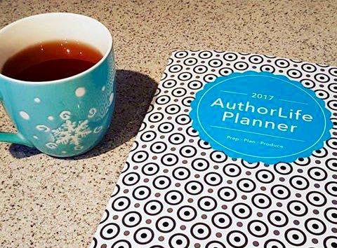 Two Necessities: My Favourite Mug Filled with Tea and my Authorlife Planner
